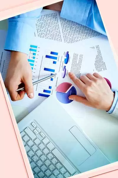 Woman typing on keyboard in office